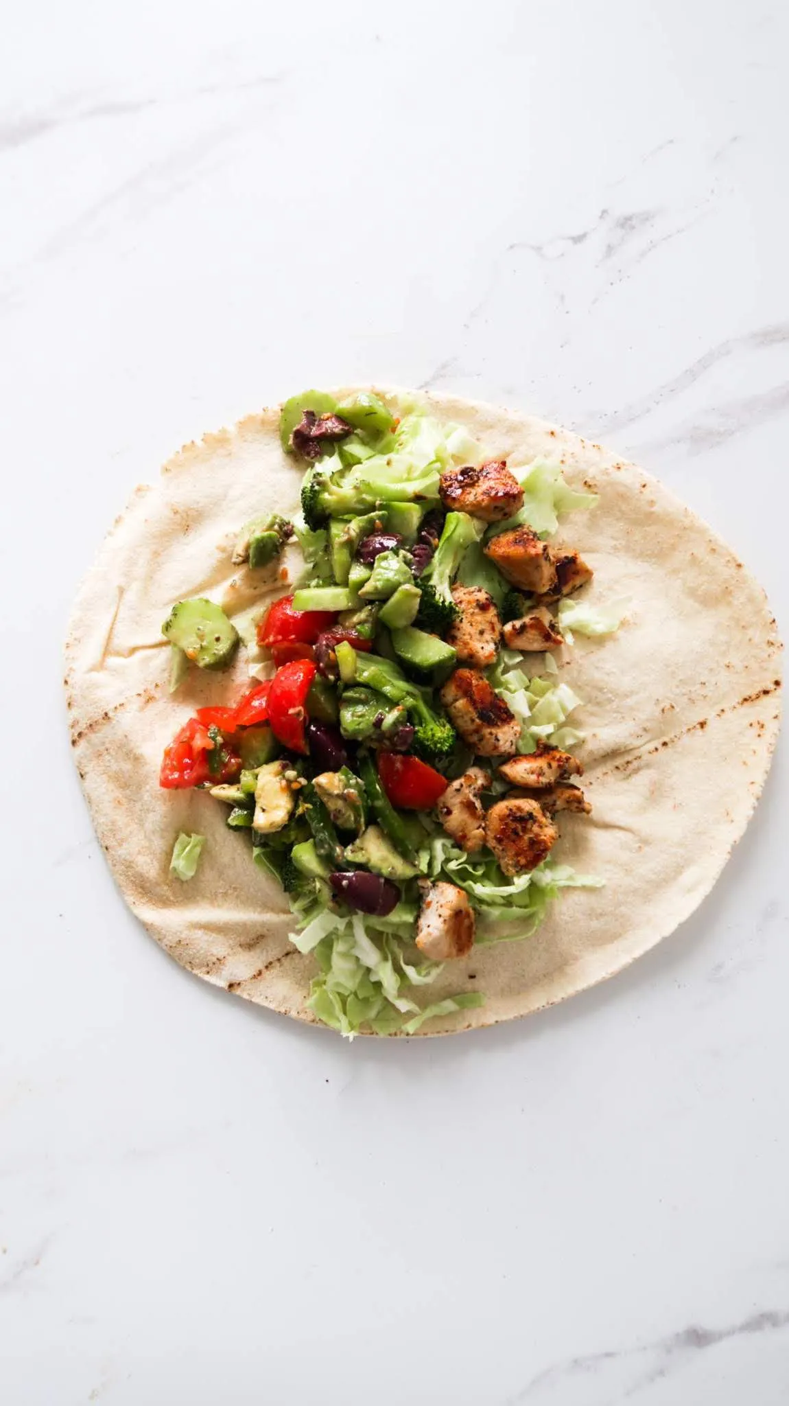 Mediterranean Chicken Wraps with Hummus and Garlicky Yogurt Sauce